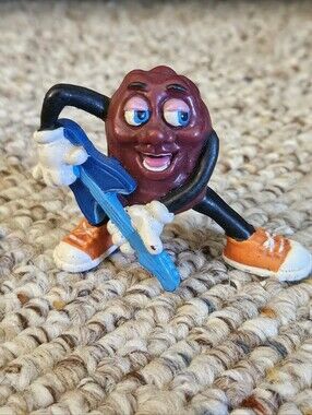 Applause 1988 California Raisin Playing Guitar